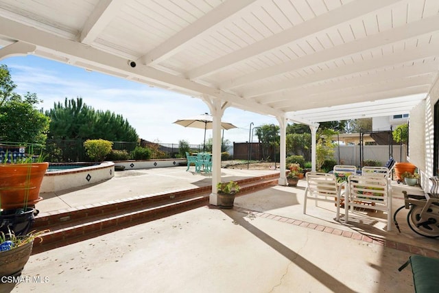 view of patio featuring a swimming pool