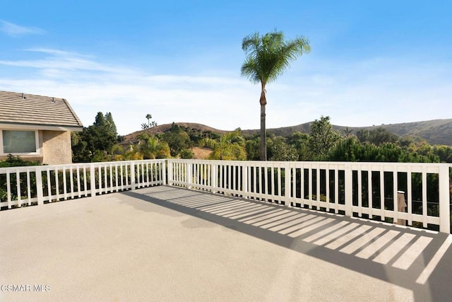 view of patio / terrace with a mountain view