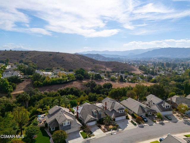 drone / aerial view featuring a mountain view