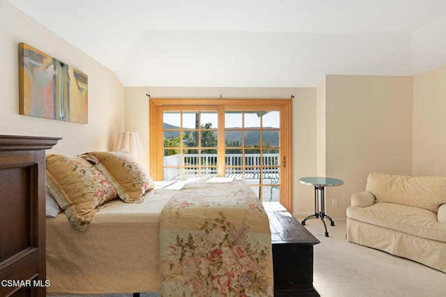 carpeted bedroom featuring access to outside