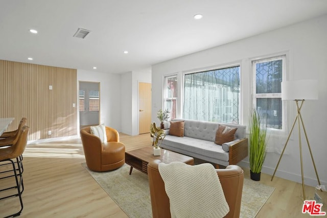 living room with light hardwood / wood-style floors