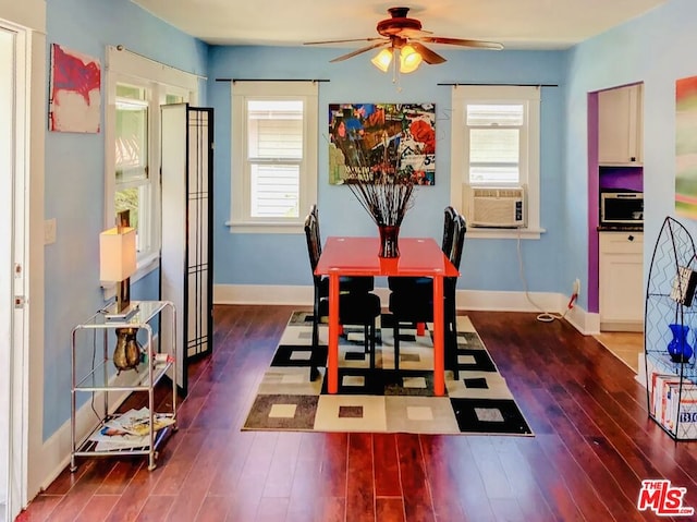 dining area featuring ceiling fan, cooling unit, and dark hardwood / wood-style floors