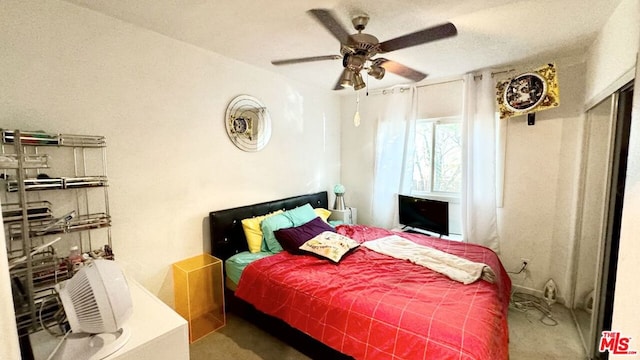 bedroom featuring ceiling fan