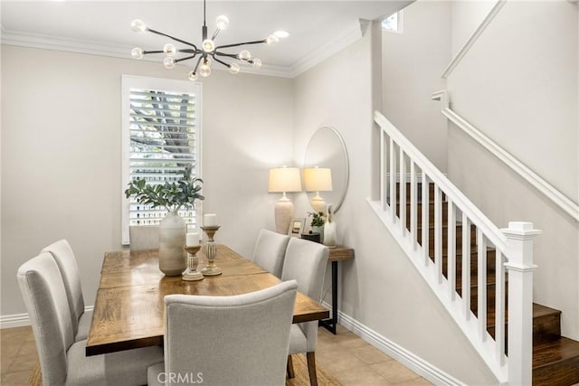 dining room with light tile patterned floors, a chandelier, and crown molding