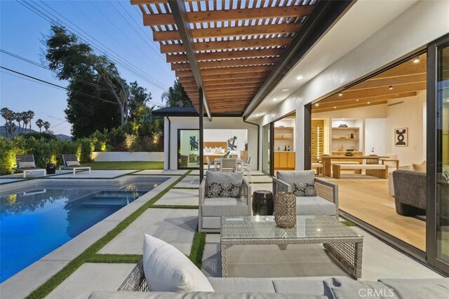 view of swimming pool featuring a pergola, outdoor lounge area, and a patio