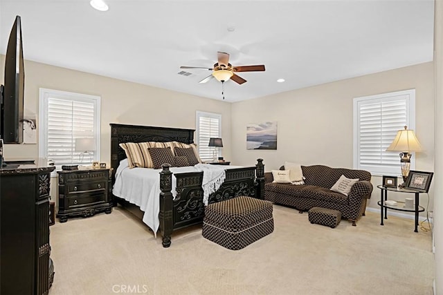 carpeted bedroom with ceiling fan