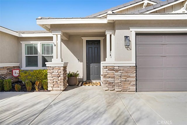 property entrance featuring a garage