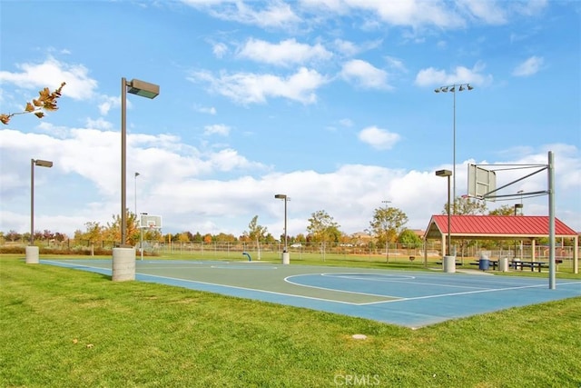 view of basketball court with a yard and a gazebo