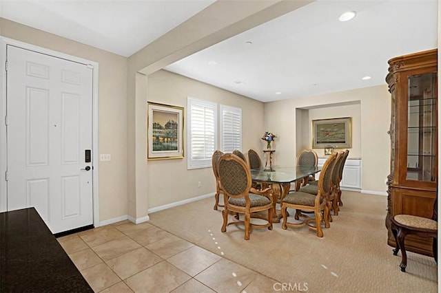 dining room with light tile patterned flooring