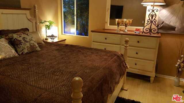 bedroom featuring light hardwood / wood-style floors