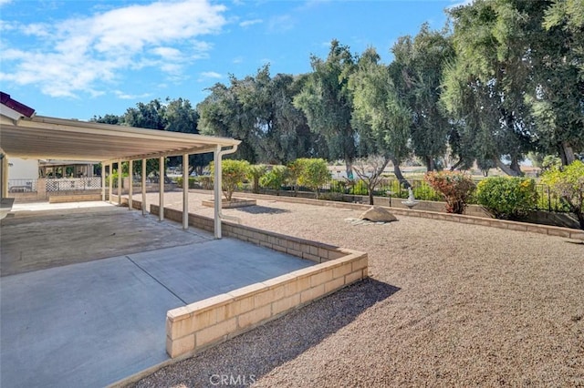 view of community featuring fence