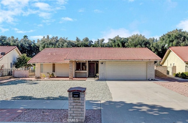 ranch-style house featuring a garage