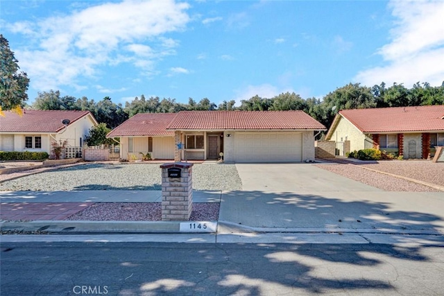 ranch-style home with a garage