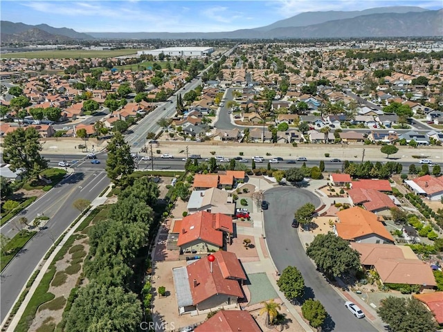 drone / aerial view featuring a mountain view and a residential view