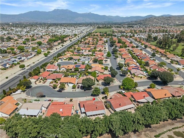 drone / aerial view featuring a mountain view and a residential view