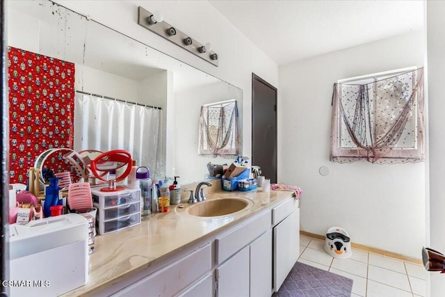 bathroom with vanity and tile patterned floors