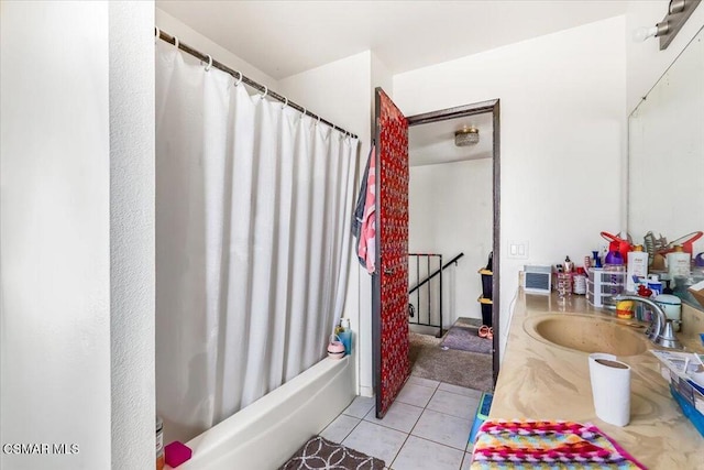 bathroom featuring vanity, tile patterned flooring, and shower / bath combination with curtain