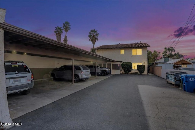 parking at dusk with a carport