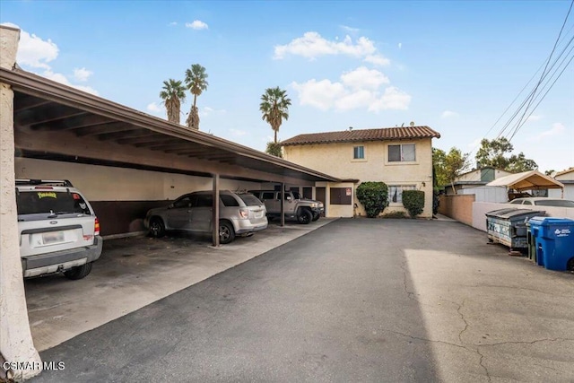 view of car parking with a carport