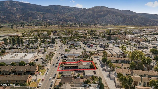 bird's eye view with a mountain view