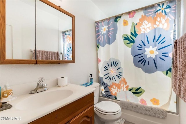 full bathroom featuring toilet, shower / tub combo, and vanity