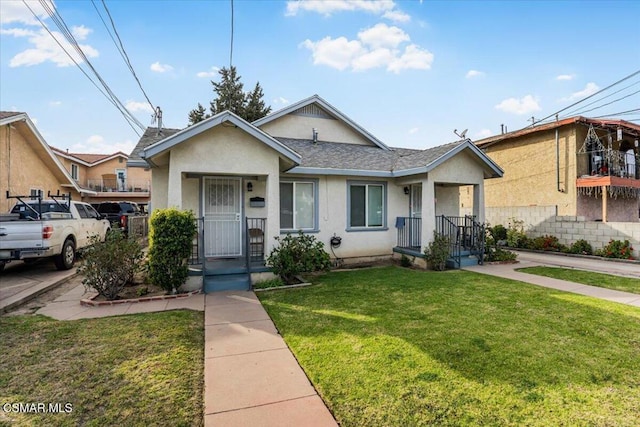 bungalow with a front lawn