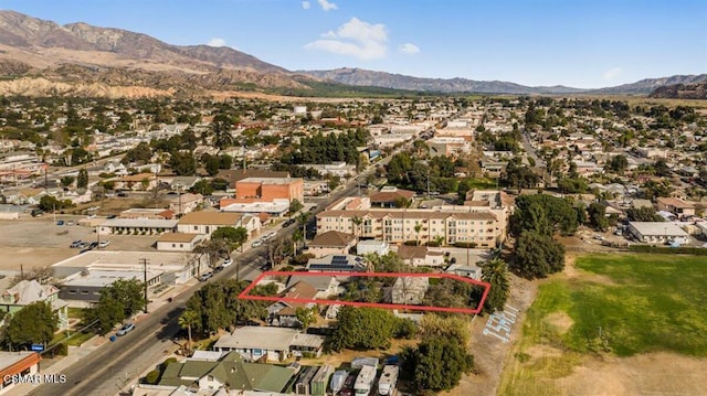 drone / aerial view featuring a mountain view