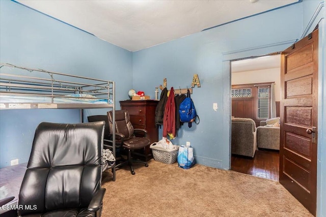 bedroom featuring carpet