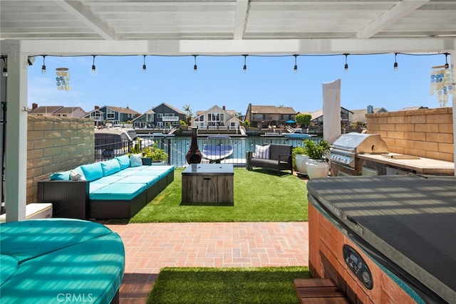 view of patio featuring a water view, an outdoor living space, a jacuzzi, and a grill