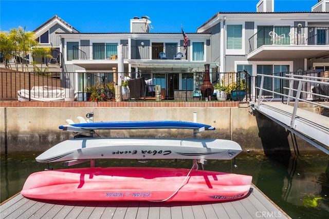 dock area featuring a water view