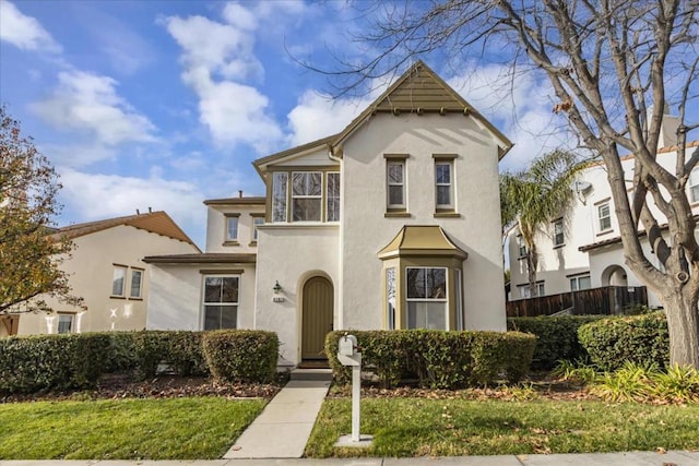 view of front of house with a front yard