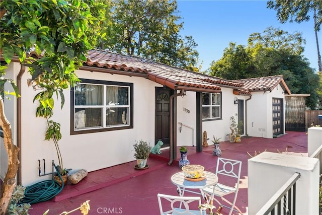 back of house featuring a patio