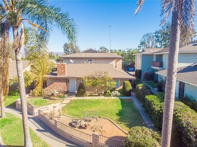 view of front property featuring a front yard