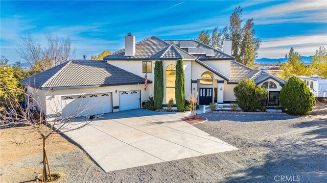 view of property featuring a garage