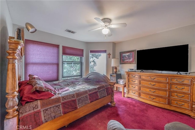 bedroom with ceiling fan and carpet flooring