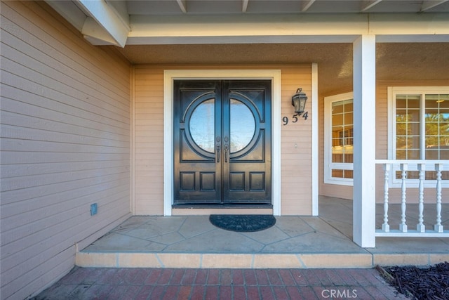 property entrance with french doors