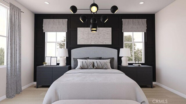 bedroom featuring light wood-type flooring