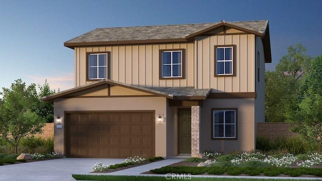 view of front of home with a garage