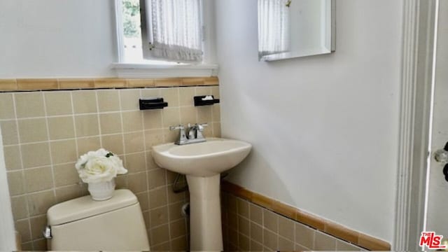 bathroom featuring toilet