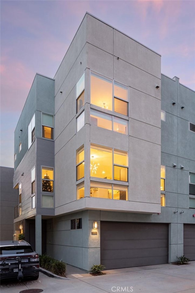 view of front of home with a garage