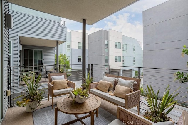 balcony featuring outdoor lounge area