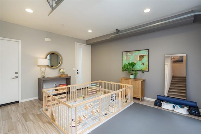 bedroom with light hardwood / wood-style flooring