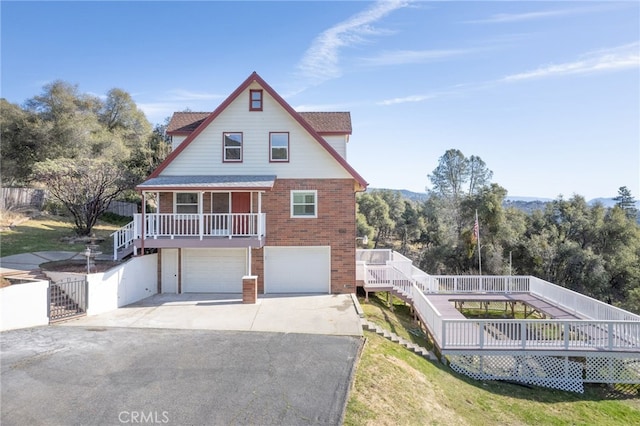 view of front of house with a front lawn and a garage