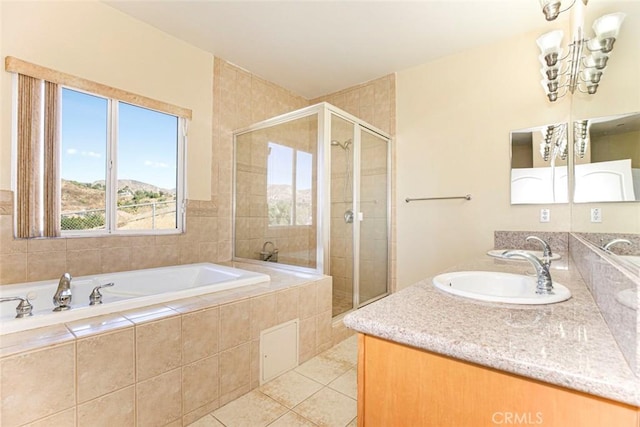 bathroom with vanity, shower with separate bathtub, a notable chandelier, and tile patterned flooring