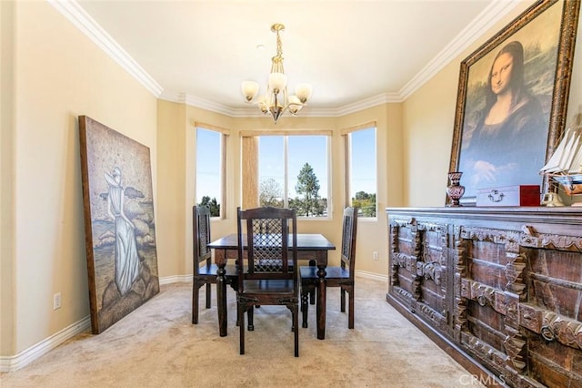 dining room featuring light carpet, ornamental molding, and a chandelier