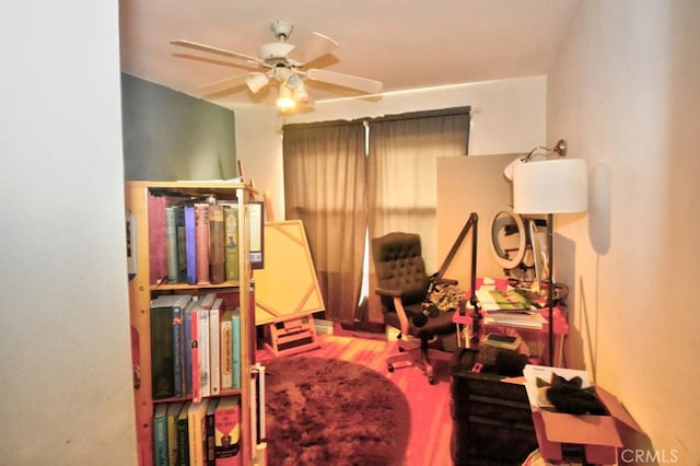 bedroom with ceiling fan and hardwood / wood-style flooring