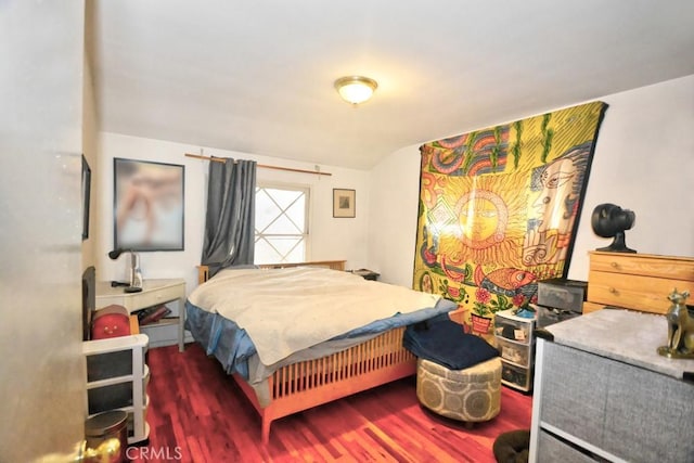 bedroom featuring wood-type flooring