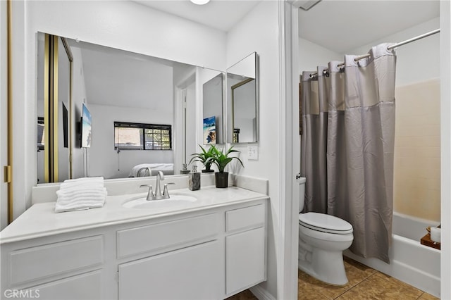 full bathroom featuring toilet, tile patterned flooring, shower / tub combo, and vanity