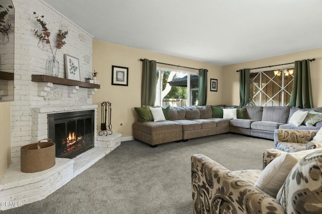 living room with a brick fireplace and carpet