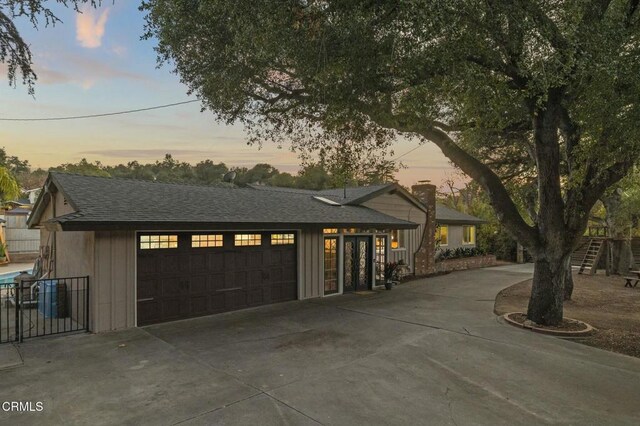 view of front of home with a garage